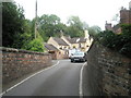 SJ6902 : Car coming from The Shakespeare Inn towards the narrow bridge by Basher Eyre