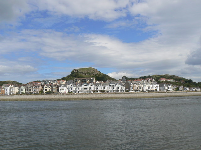 Deganwy seafront with the Castle remains behind by John Rostron
