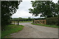 Track from Heath Hill farm meets the A429