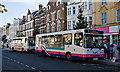 Collecting Passengers on Pier Avenue