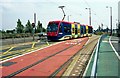 Midland Metro tram 15 in Bilston Road, turning right