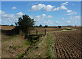 Footbridge, ditch and open fields