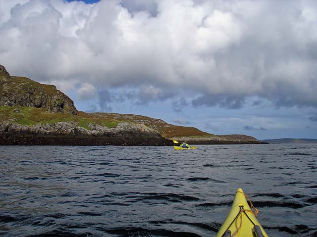 Kayaking along the coast of Fuidheigh.