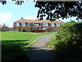 Back view of "Cornish Unit" style housing, from cycle trail 42