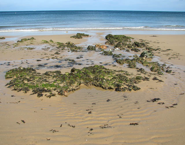 receding-tide-at-east-runton-beach-evelyn-simak-cc-by-sa-2-0