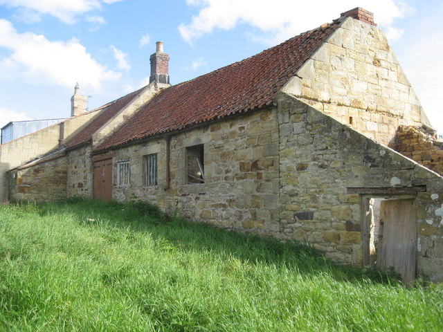 Derelict cottage on the end of the terrace in Guyzance main street