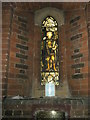 Stained glass window on the north wall at St Peter