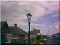 Victorian gas lantern in a front garden on Cross Road