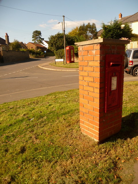 Bradpole: postbox № DT6 91 and phone, Court Close
