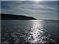 SS4229 : Westward Ho! : Headland, Sun Sea Reflections & Coastline by Lewis Clarke