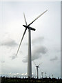 SH8459 : Wind Turbines from near Bryn Gwynt by Rowena Evans