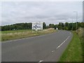 Road sign approaching roundabout