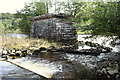 Arch of the old railway bridge which crossed the Spey