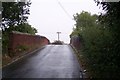 TQ8244 : Water Lane roadbridge over the railway by David Anstiss