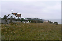 TR3747 : Clifftop houses near Oldstairs Bay by John Rostron