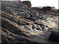 SX6642 : Rocks near The Delvers by Derek Harper