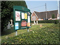 Looking across the churchyard towards the primary school