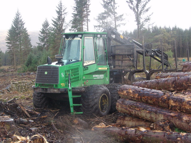 John Deere forwarder stands idle alongside the Southern Upland Way
