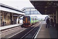 An eastbound train departs from Worksop station