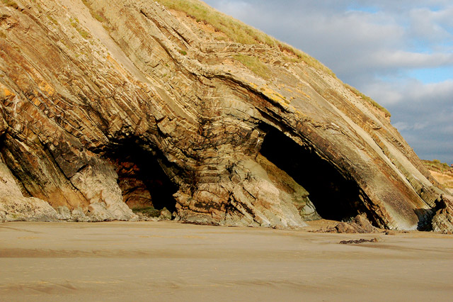 Folds and erosion in rock strata at Newgale beach
