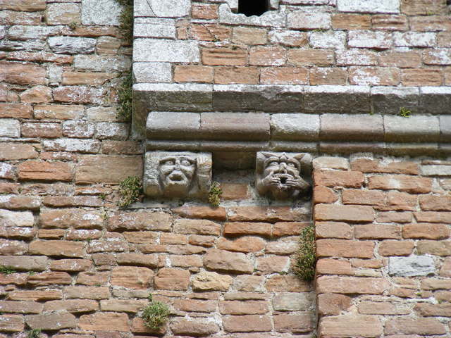 Gargoyles on wall at Brougham Castle