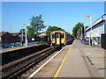 Windsor to London train arriving at Ashford station