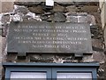 Inscription stone, PUPs Clock building