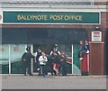 PSNI guard and a gang of inquisitive estate kids at Ballymote Post Office.