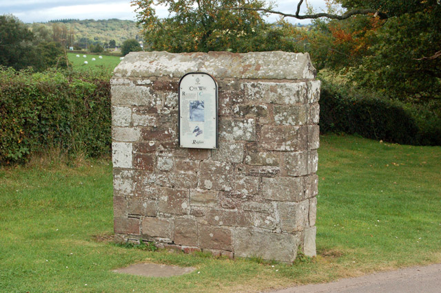 Information sign on stone-built plinth at Raglan Castle