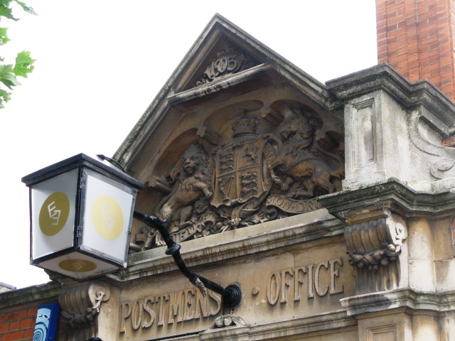 Edward VII crest above the entrance to the (former) Sorting Office, Leighton Road, NW5
