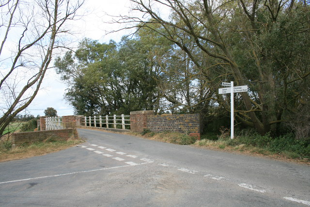 Road junction by a bridge over the Great Brook