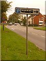 Shaftesbury: bus parking signpost (right-facing symbol)