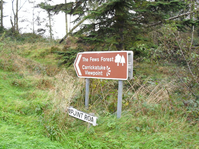 Signs at Armaghbrague © Dean Molyneaux cc-by-sa/2.0 :: Geograph Ireland