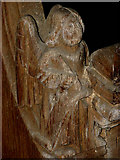 TG1020 : St Mary's church - angel bench end by Evelyn Simak