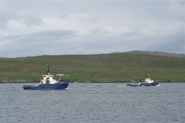 Tugs heading out to pilot station