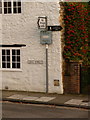 Sherborne: road signs of varying vintage in Long Street