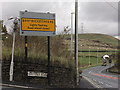 Snow road sign at Grains Bar