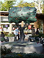 Street: apple-tree sculpture at Clark?s Shopping Village