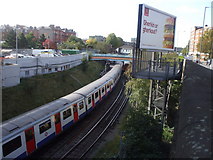 TQ2478 : District Line, just east of West Kensington Station by John Lord