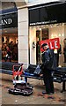 Busker in Lister Gate