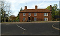 Please red-brick house beside the A28 at Godmersham