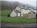 Houses off B4393 at Llanwyddyn