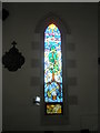 Stained glass window on the south wall at  St Coleman