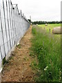 Footpath past glasshouses near Felderland Lane