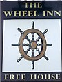 Sign for the Wheel Inn