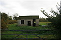 Derelict shed in a field