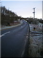 Upper Hulme milepost and the A53 north of Leek