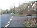 Junction of  Catteshall Lane and Carmargue Place