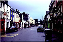 V9690 : Killarney - High Street in early morning by Joseph Mischyshyn
