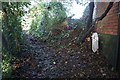 Clerkenwell marker on path near Moorlands Road